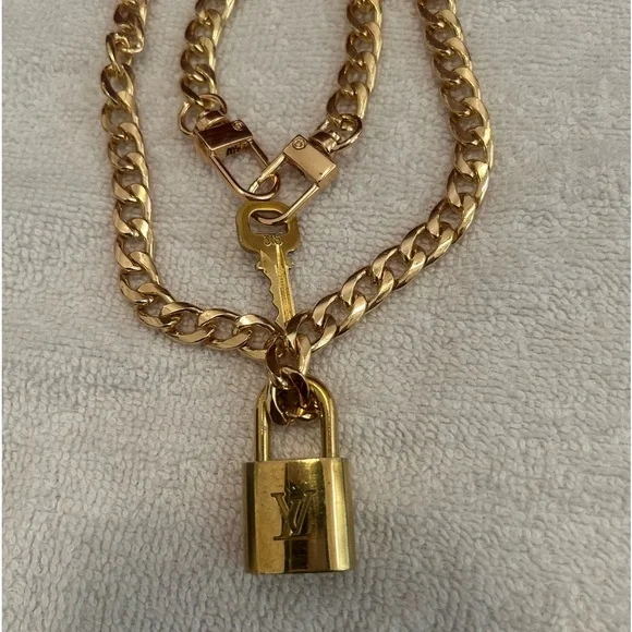 Authentic #315 Louis Vuitton Lock + Key Necklace and Bracelet Set - Picture 2 of 5